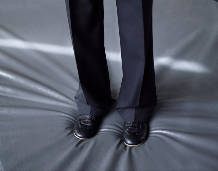 Black dress pants in Dark fabric, model shot, Front view Straight leg