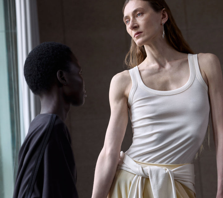 White tank top in White cotton, model shot, Worn view Fitted design
