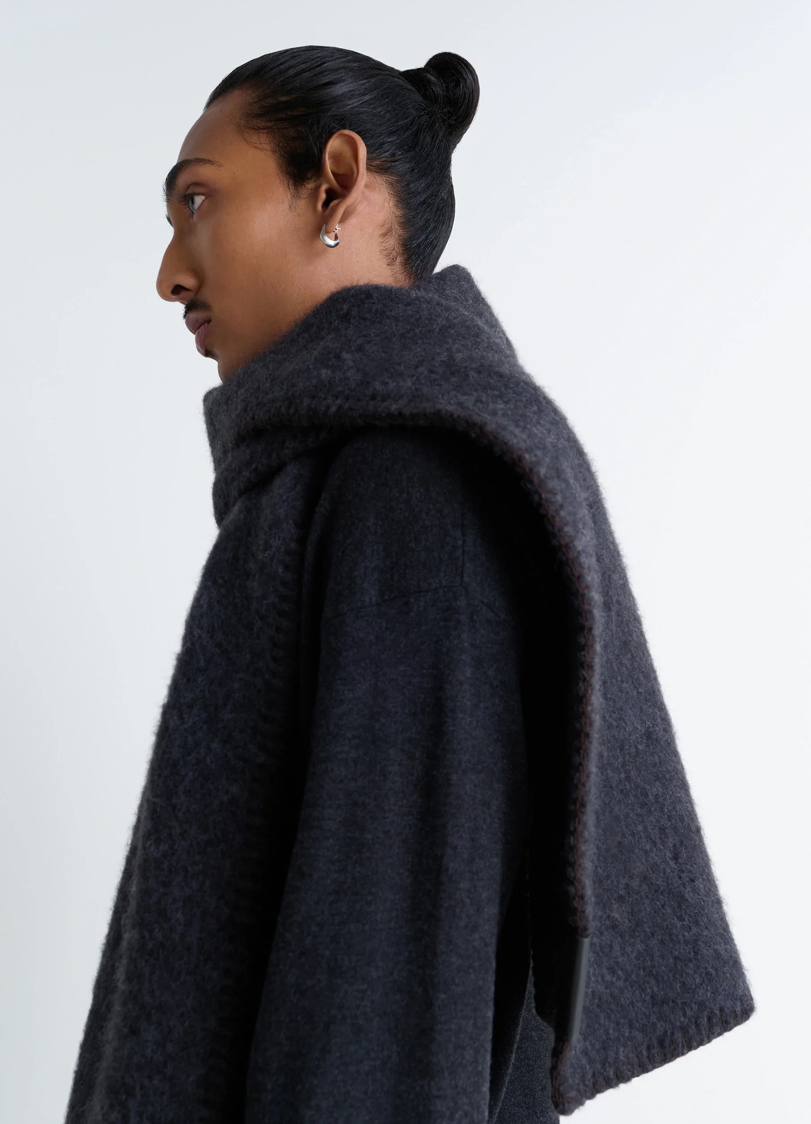Cocotte fluffy scarf in fluffy alpaca, model shot, profile view wrapped around neck