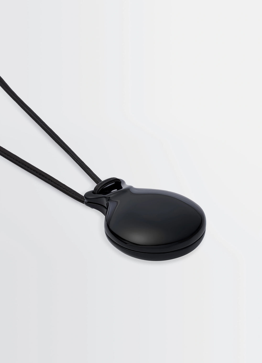 Lemaire Necklace with Castanets in Black, product shot, angled top view glossy finish detail
