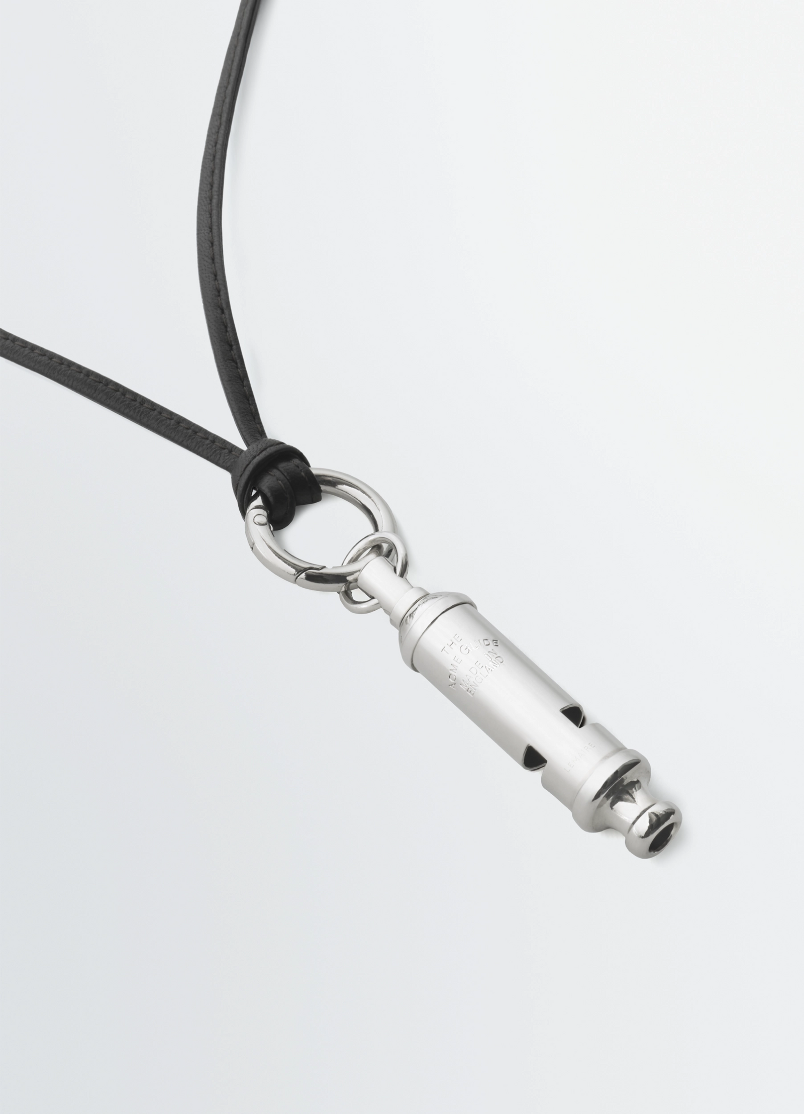 Acme whistle necklace in brass with silver finish, product shot, detail shot close-up with loop