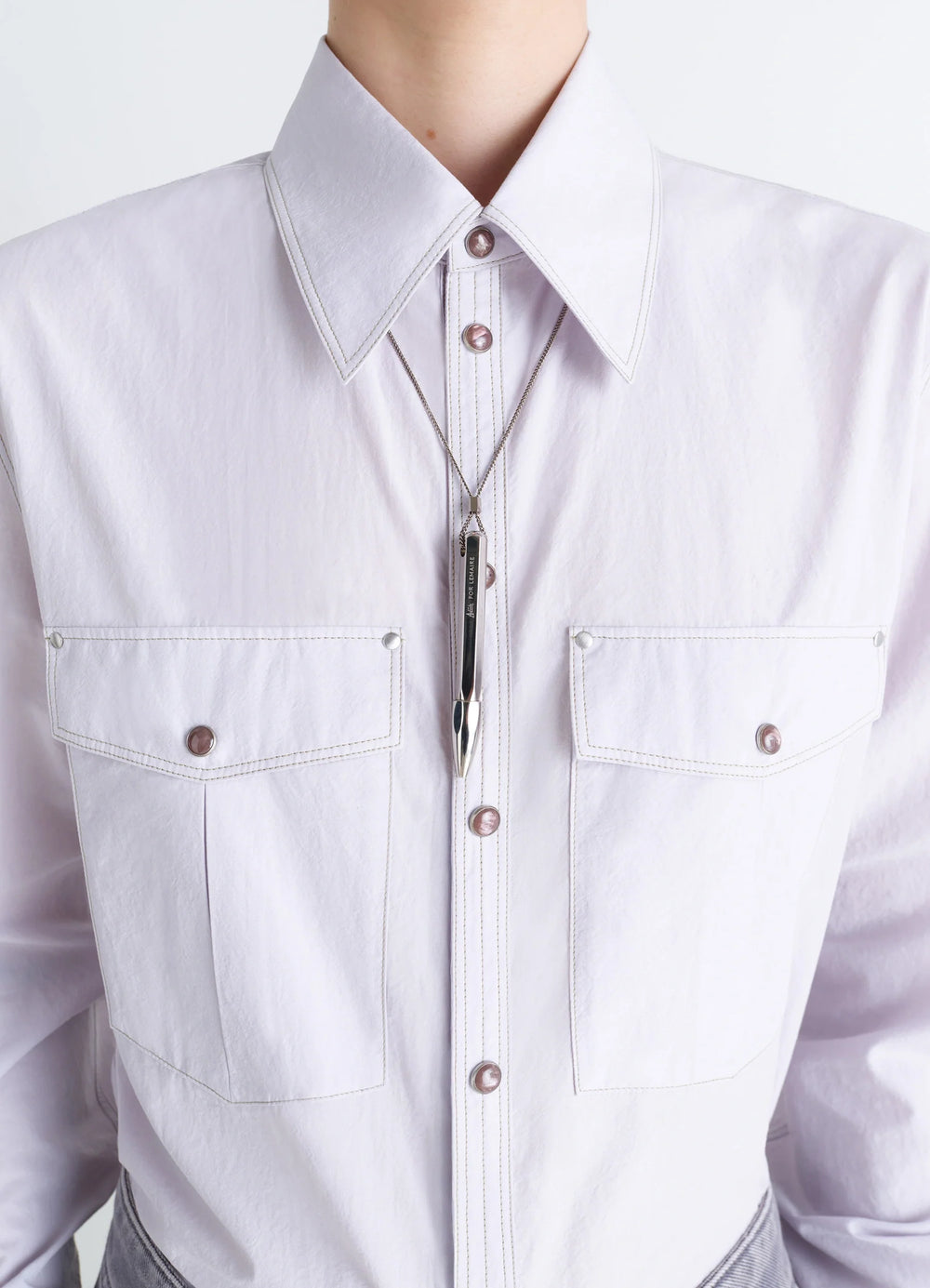 Aubock Pen Necklace in Silver Metal, model shot, detail shot worn over shirt