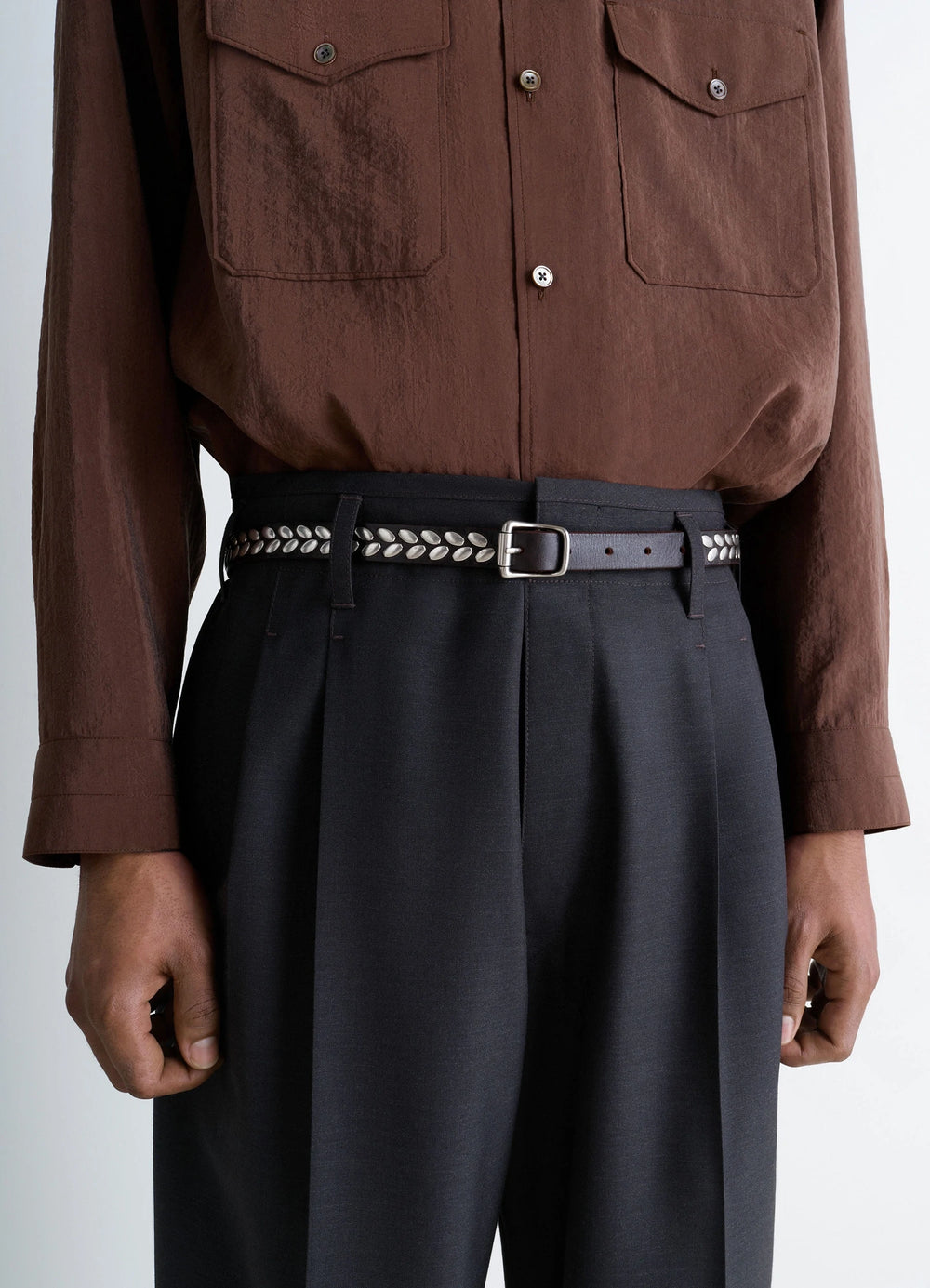 Almond Stud Belt 20 in vegetable-tanned leather, model shot, worn view silver buckle detail