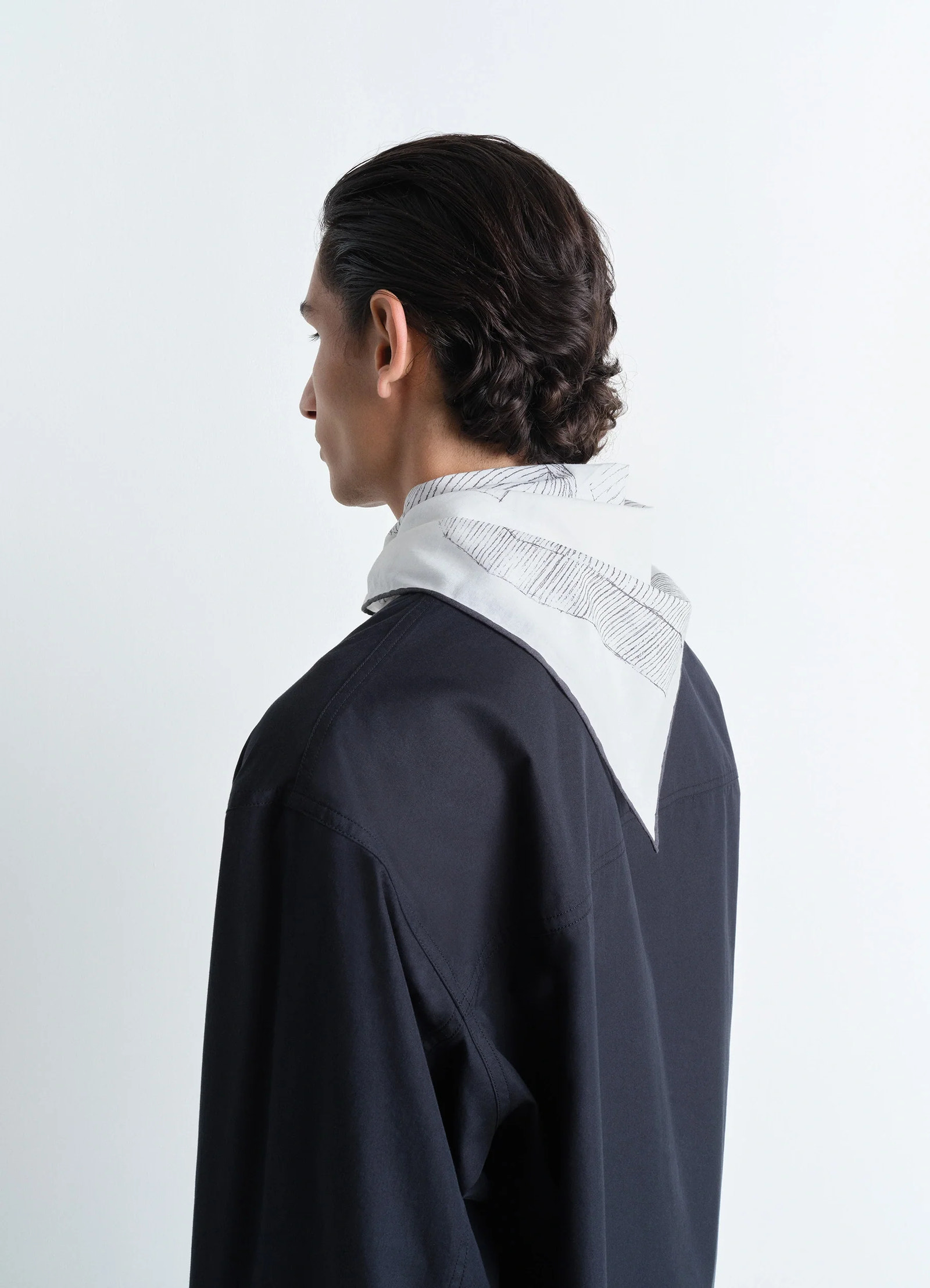 Philippe weisbecker bandana in 60 green houses cotton, model shot, back view worn over shirt