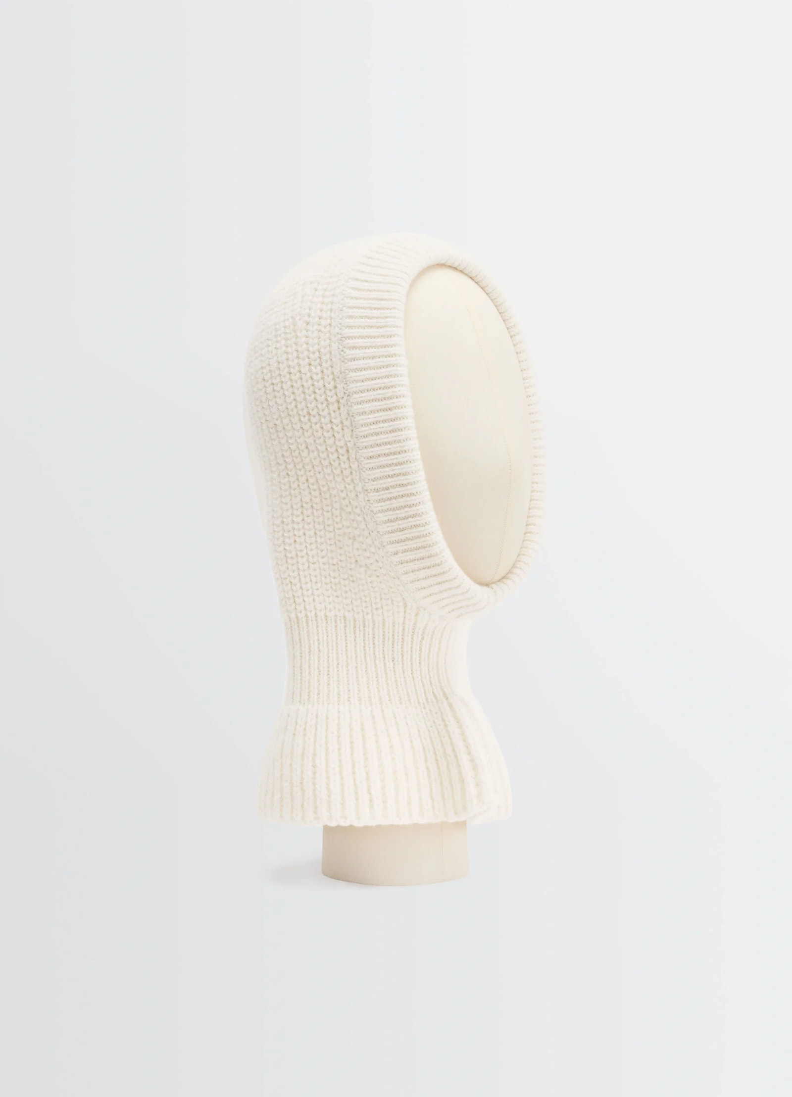 Hood in ribbed wool and alpaca blend, product shot, three-quarter view elongated neck design