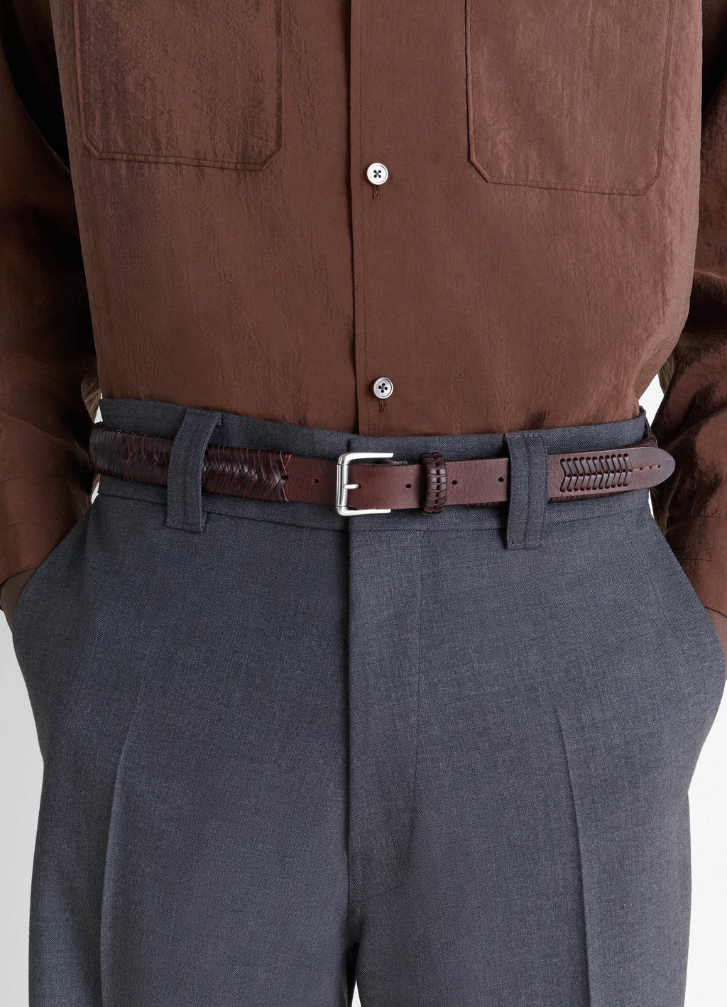 Weaved Belt 25 in Shiny Braided Leather, model shot, belt waistline view woven texture detail