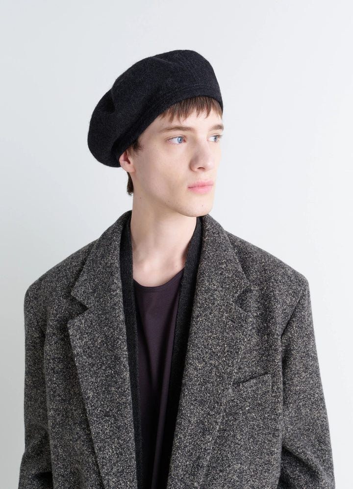 Oversized Beret in Wool and Alpaca Blend, model shot, Side view Textured and Lightweight