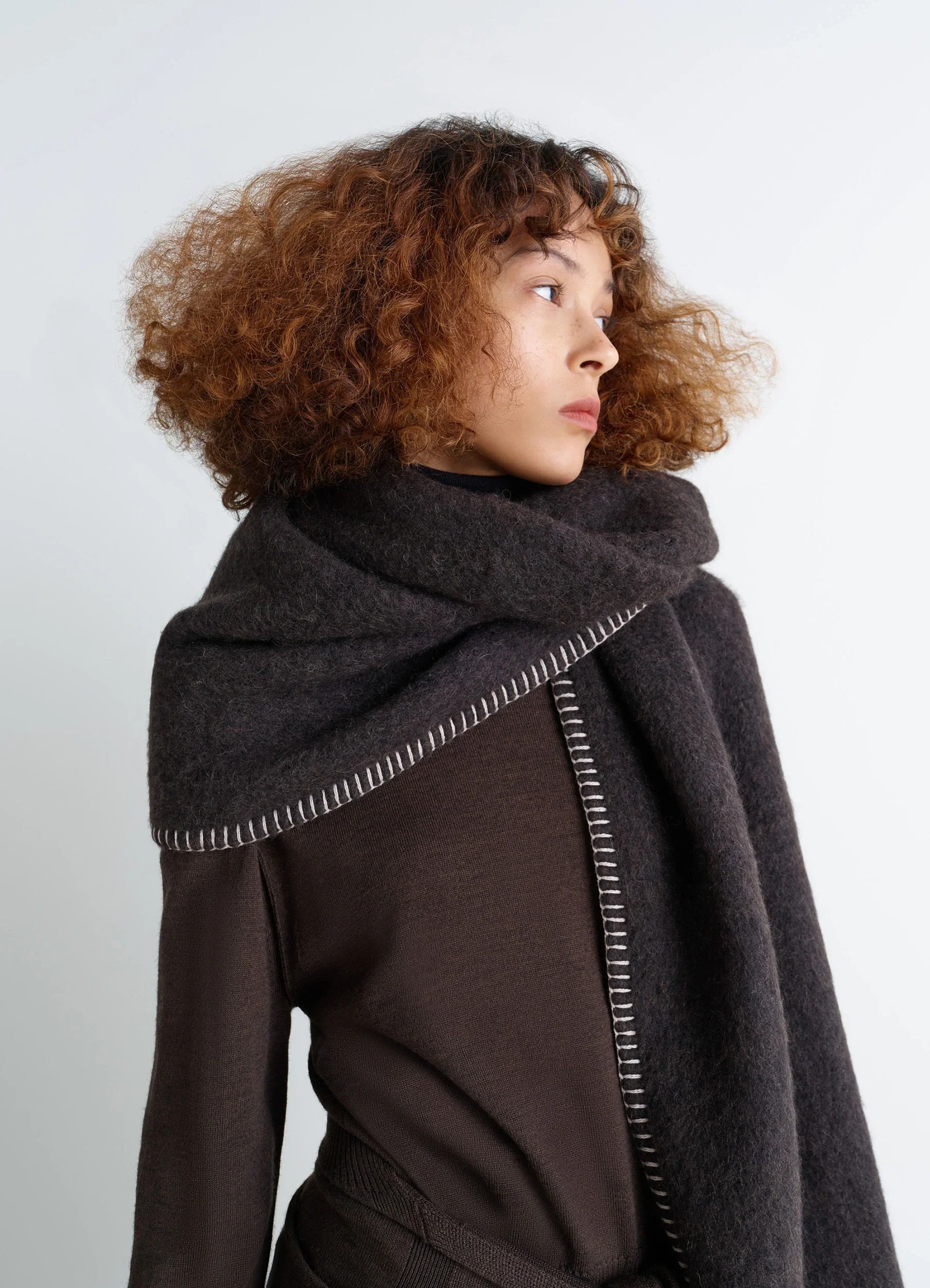 Lemaire maxi fluffy cocotte in charcoal alpaca, model shot, side view oversized scarf