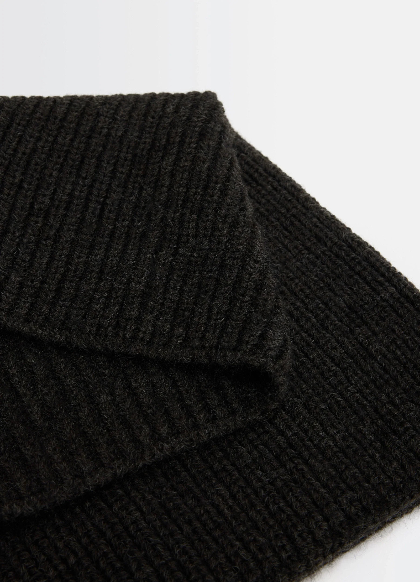 Snood in ribbed wool and alpaca blend, product shot, angled close-up overlapping layers visible