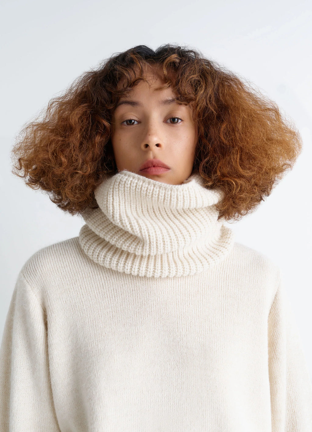 Ribbed Wool Alpaca Snood in Cream Wool Alpaca Blend, model shot, Front view Ribbed knit texture