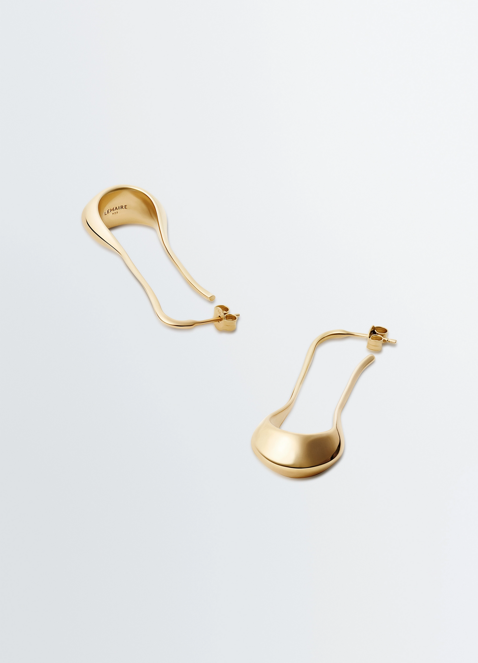 Lemaire short drop earrings in vermeil, product shot, top angled view sleek loop design