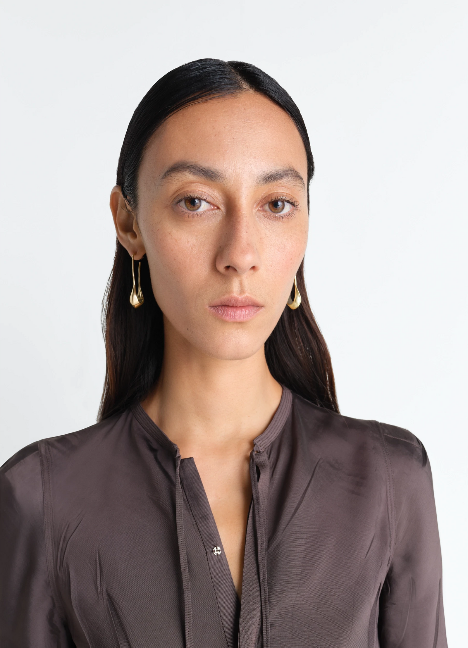 Lemaire short drop earrings in vermeil, model shot, three-quarter view elegant hanging design