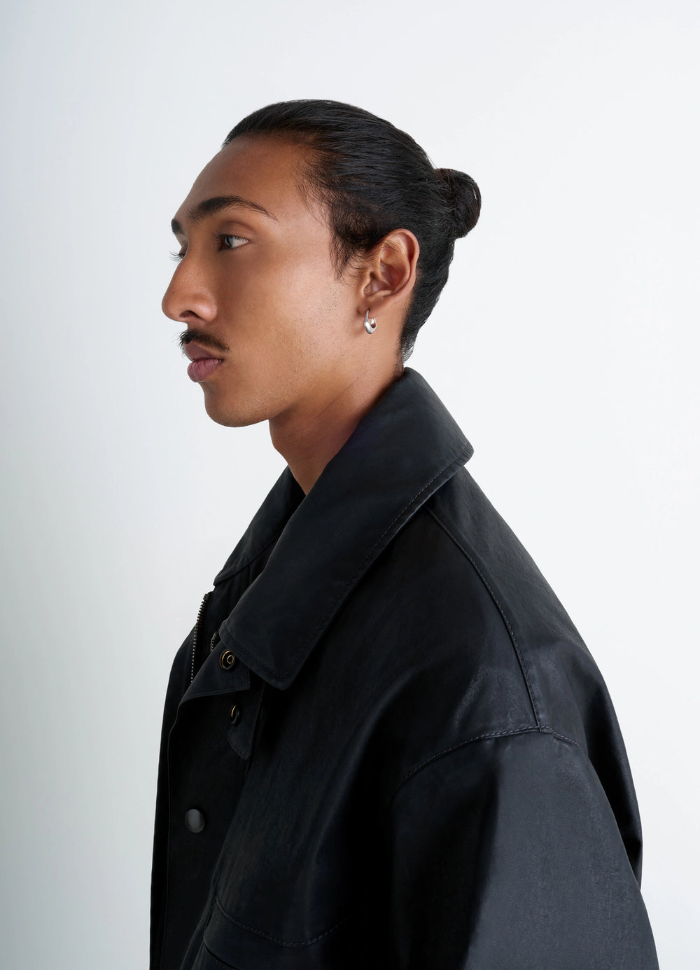 MINI DROP EARRING in rhodium-plated silver, model shot, side view minimalist design