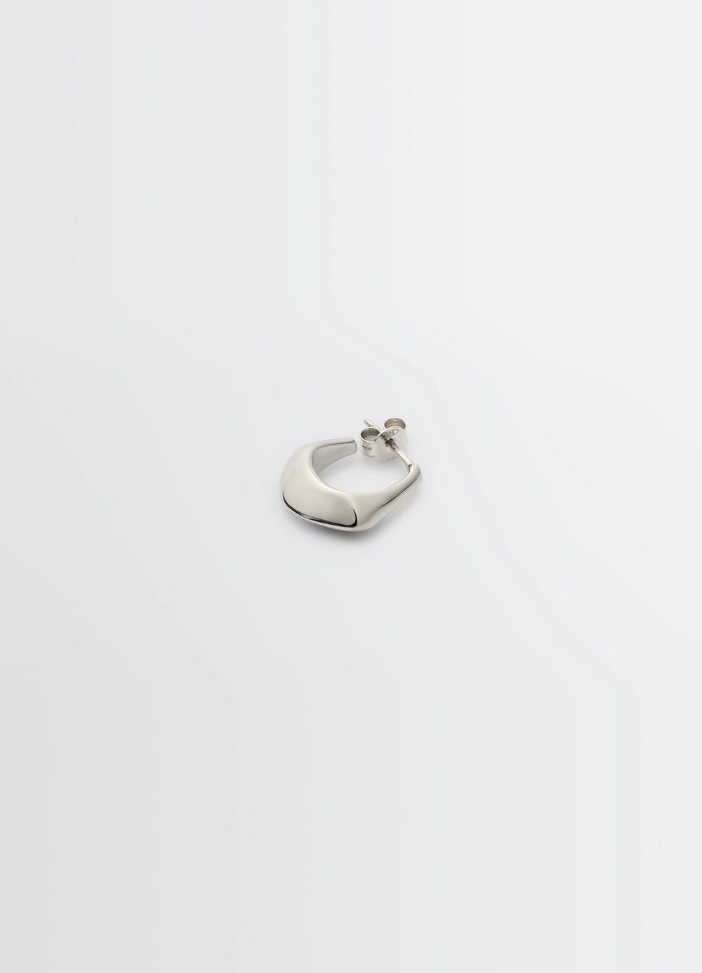 MINI DROP EARRING in rhodium-plated silver, product shot, angled detail shot sleek asymmetric curve