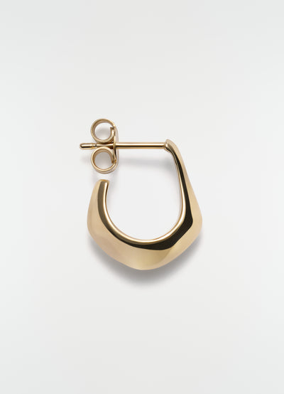 Mini drop earring in gold vermeil metal by LEMAIRE with smooth polished finish on white background close-up