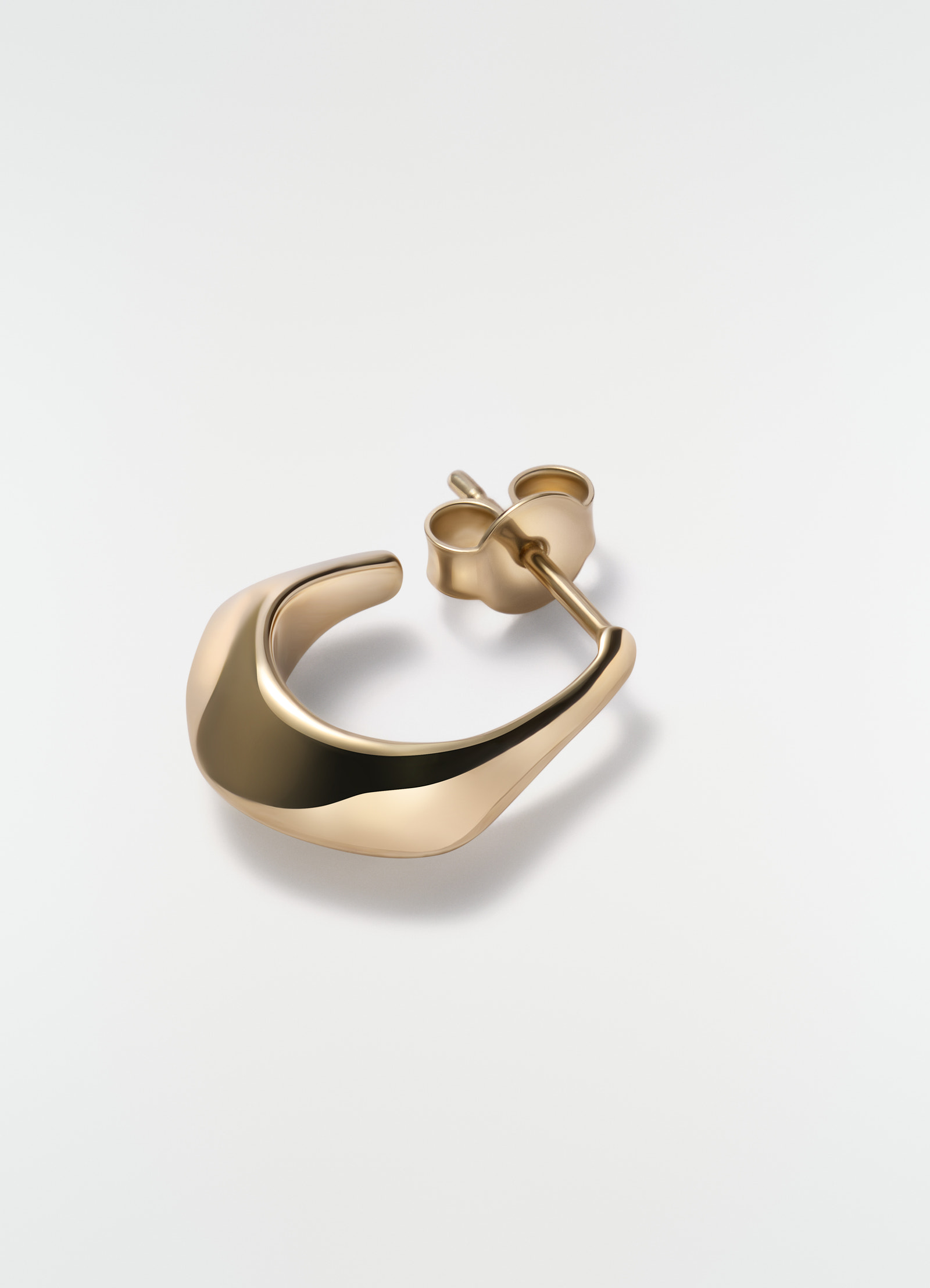 Mini drop earring in gold vermeil metal lemaire close-up detail on white background