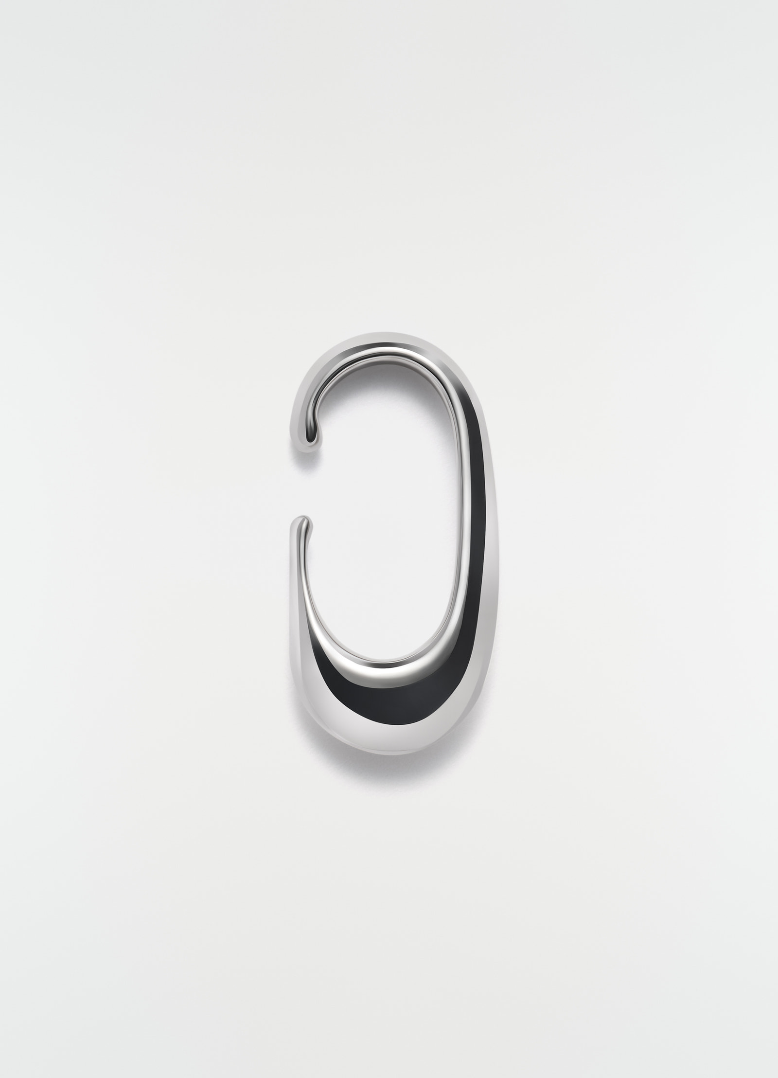 Long silver metal drop earcuff lemaire shot on plain white background detail view