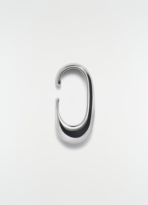 Long silver metal drop earcuff lemaire shot on plain white background detail view