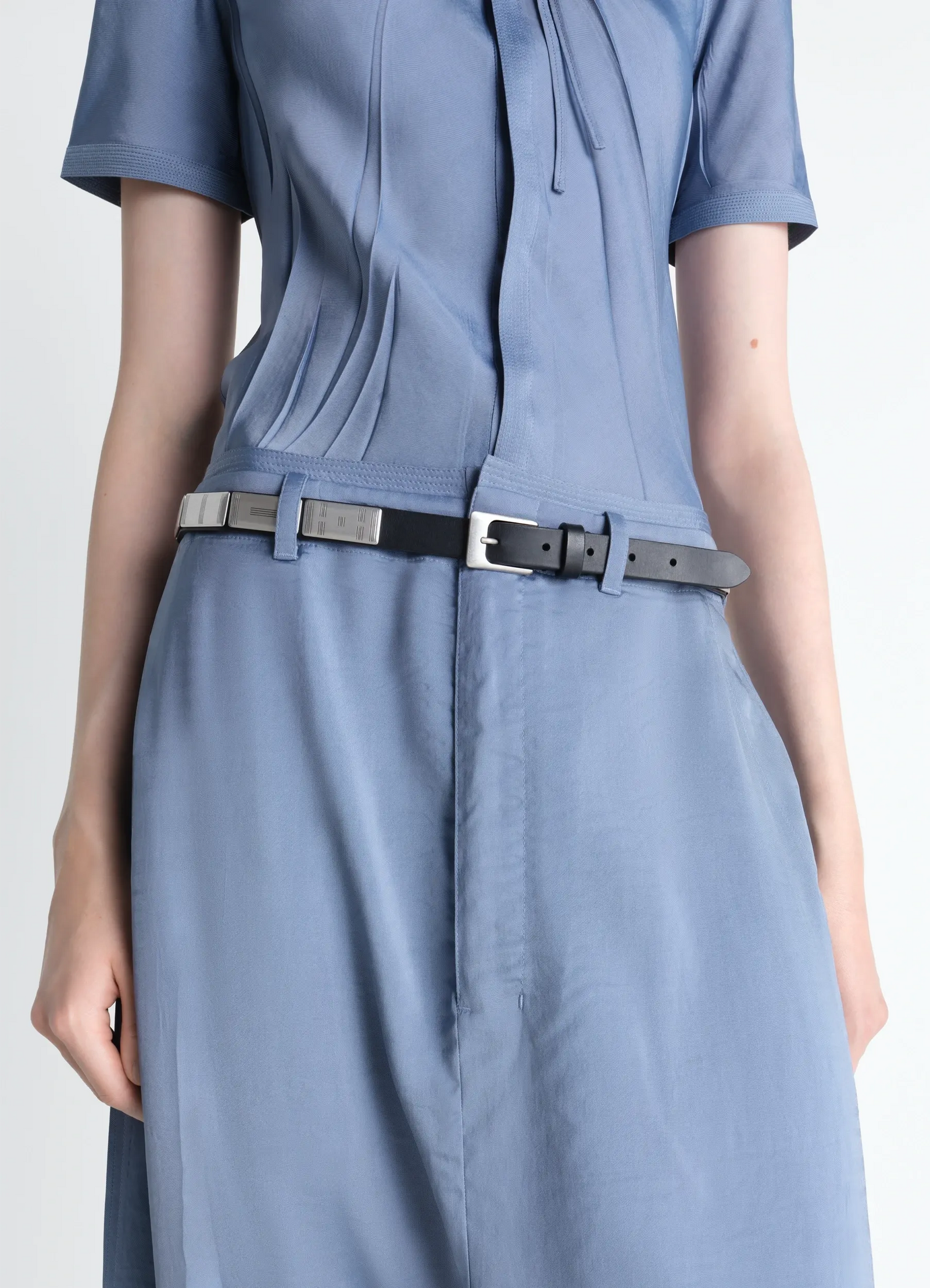 Buffalo studs belt 20 mm in leather, model shot, side view worn by model