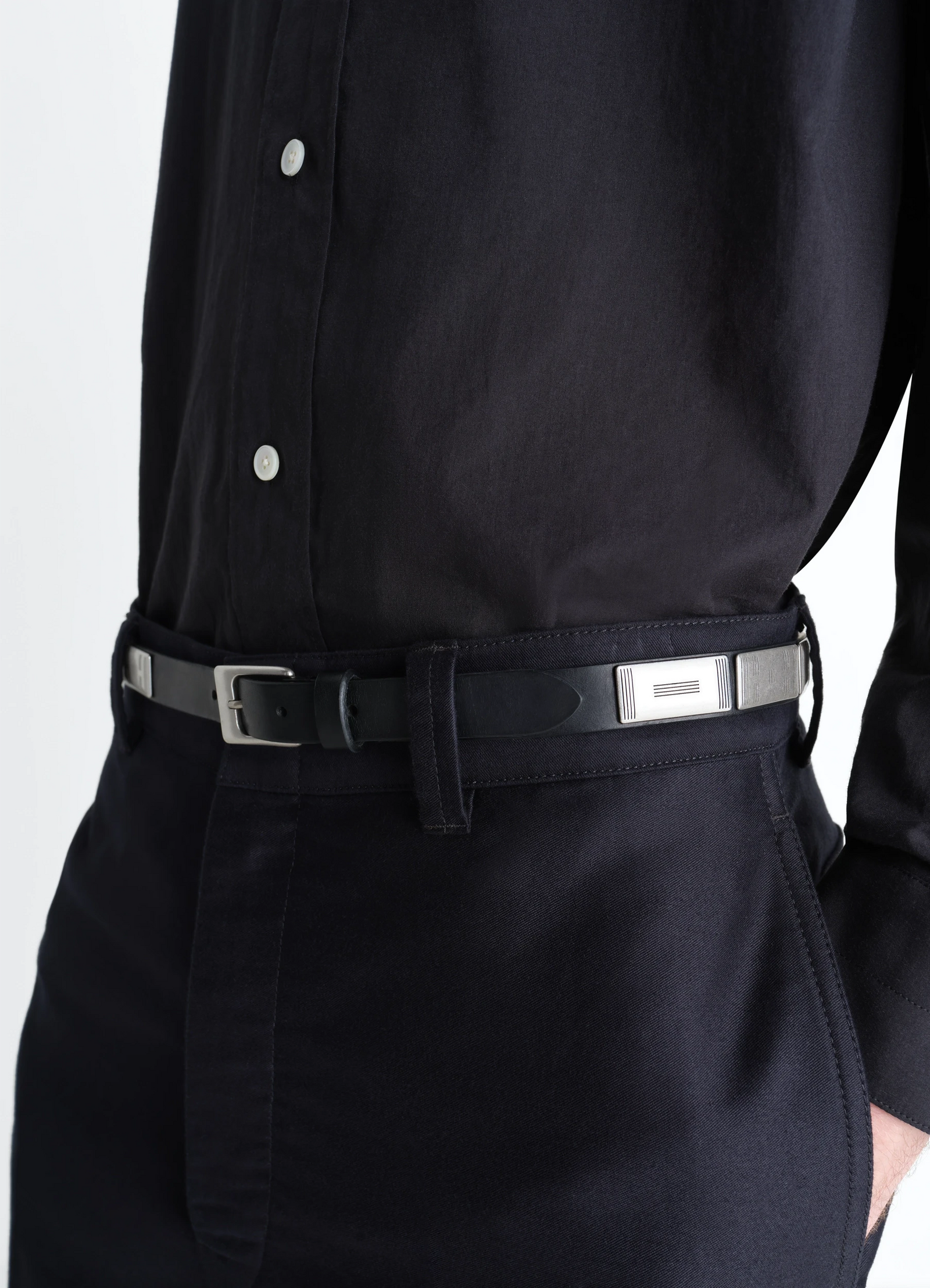 Buffalo studs belt 20 mm in leather, model shot, close-up detail shot subtle metal buckle