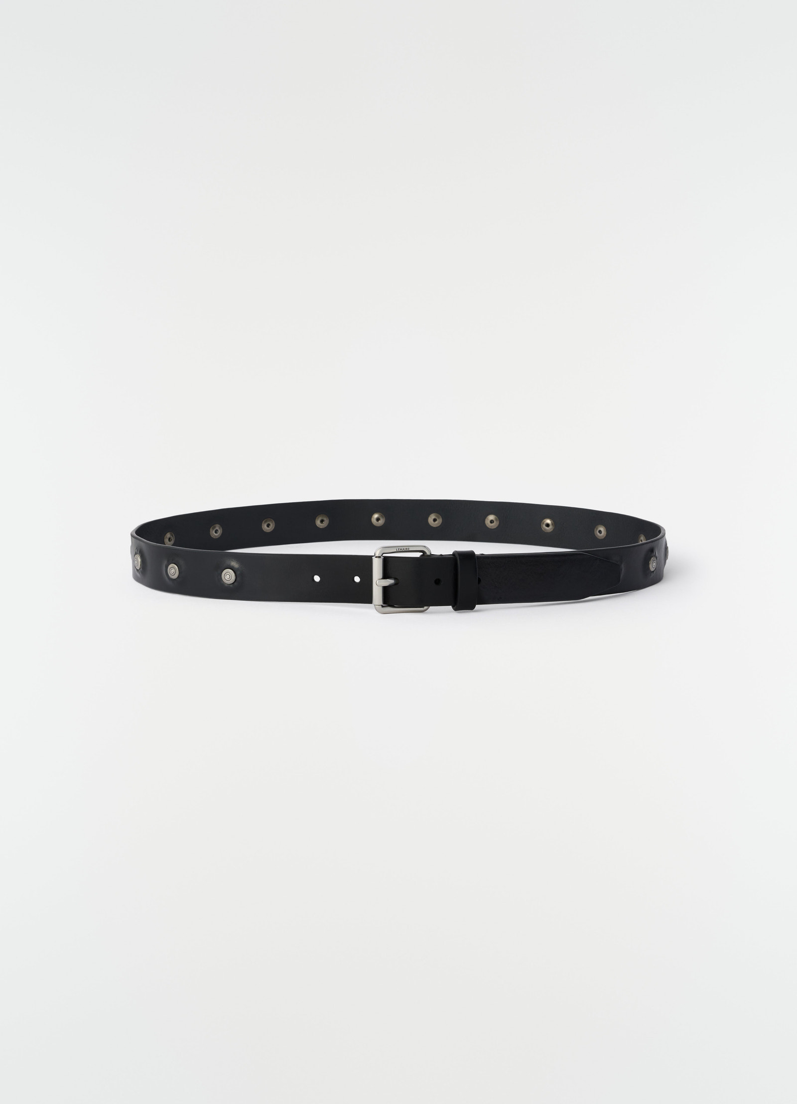 Marguerite black vegetable-tanned leather belt with silver studs lemaire flat lay on white background