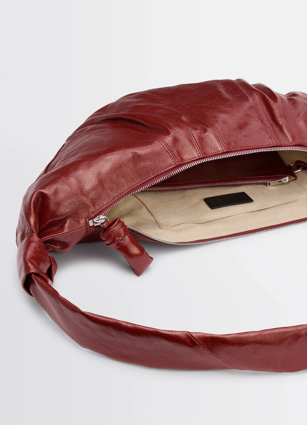 Lemaire Large Croissant Bag in Red coated cotton canvas, product shot, top detail view exposed zipper opening
