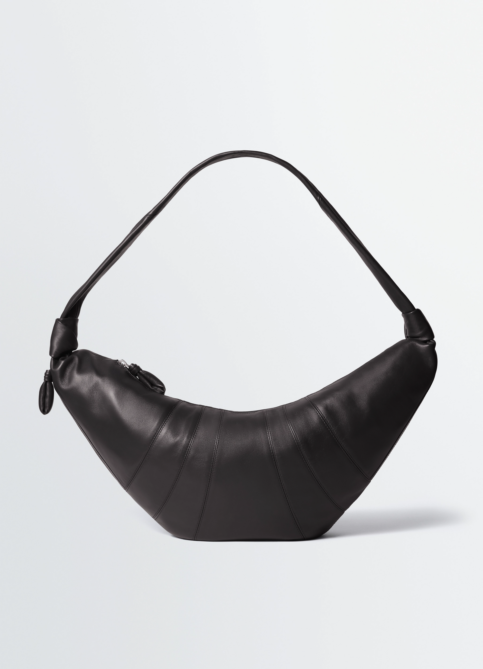 Lemaire large croissant bag in nappa lamb leather, product shot, front view curve and topstitched panels