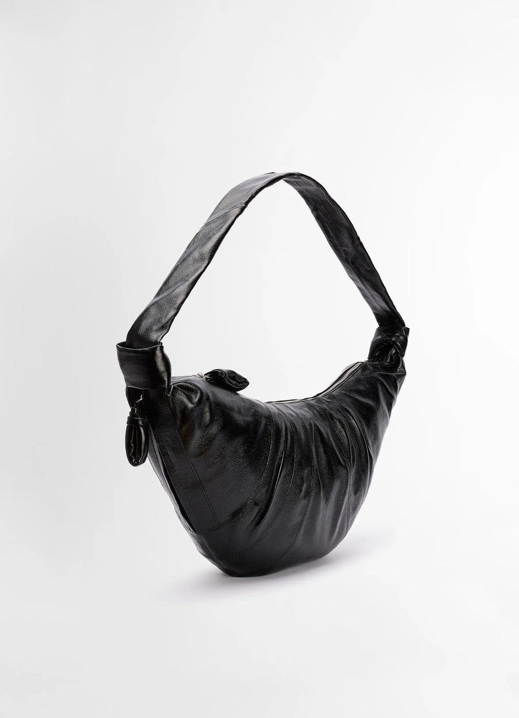 Lemaire Large Croissant Bag in Black Coated Cotton Canvas, product shot, back view twisted strap detail