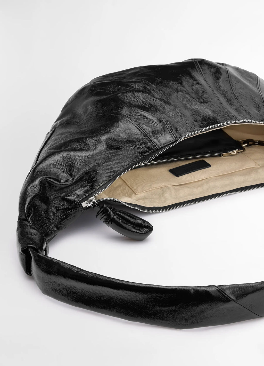 Lemaire Large Croissant Bag in Black Coated Cotton Canvas, product shot, top detail shot open interior view, twisted handle