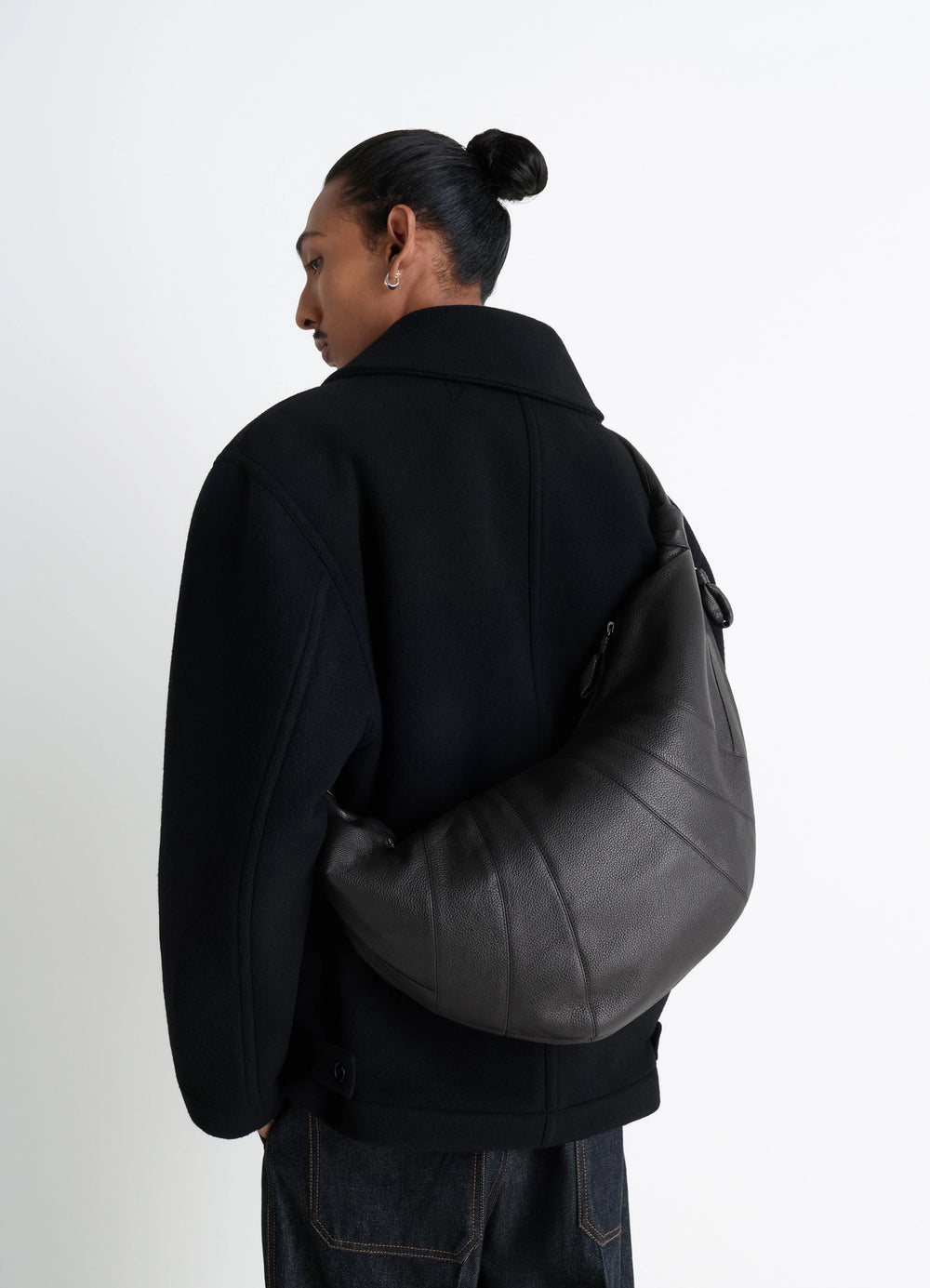 Lemaire Large Croissant Bag in Grained Leather, model shot, back view curved silhouette
