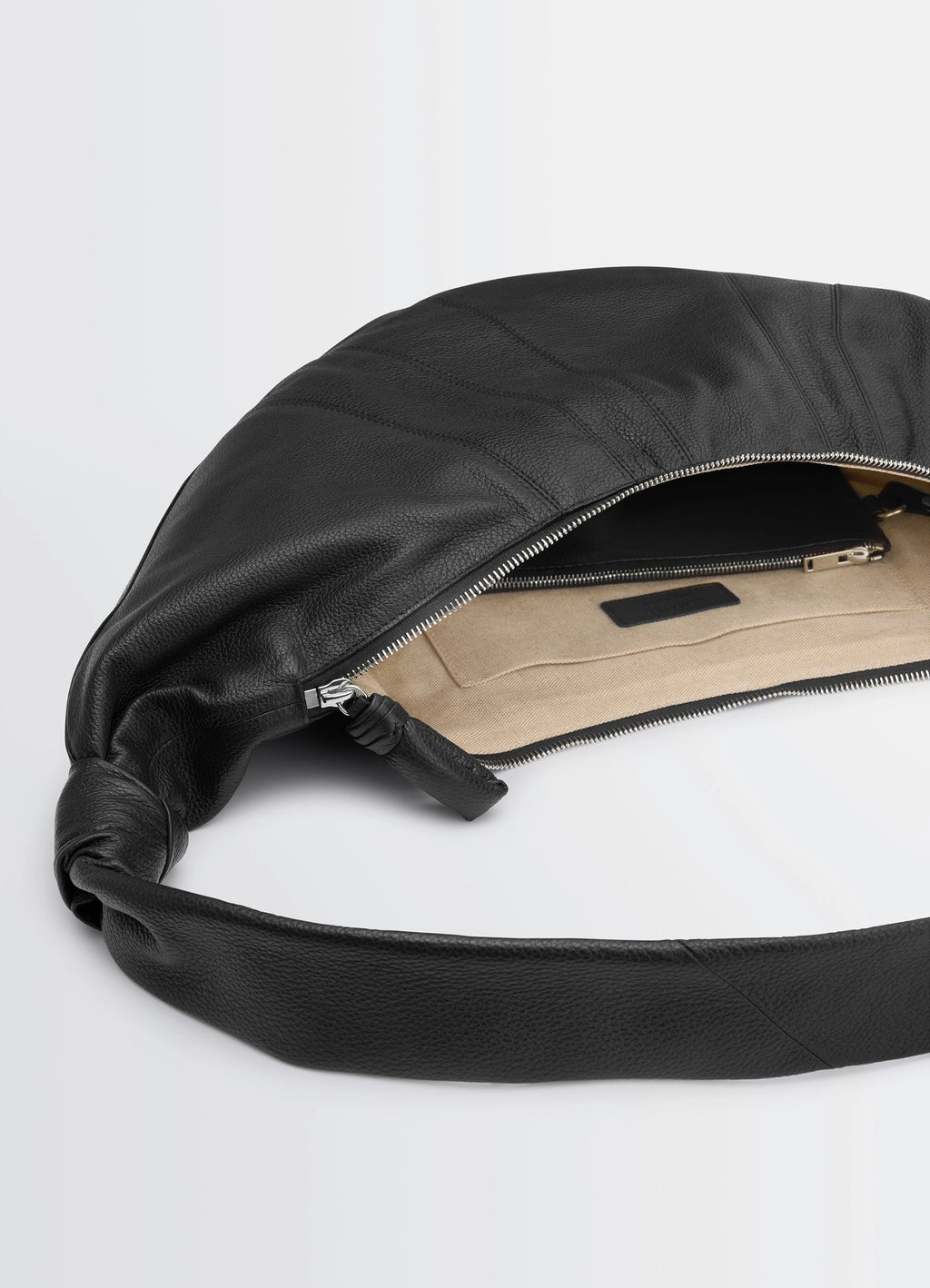 Lemaire Large Croissant Bag in Grained Leather, product shot, top zipper view interior pocket visible