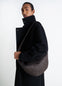Lemaire Large Croissant Bag in Grained Leather, model shot, Side view Curved design