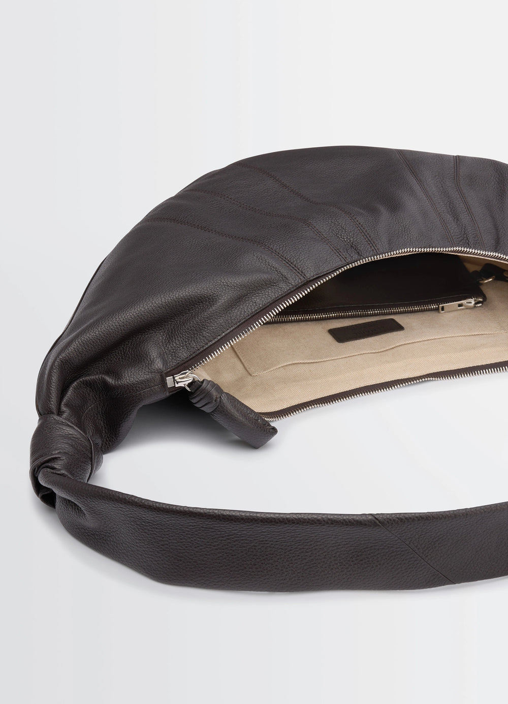 Lemaire Large Croissant Bag in Grained Leather, product shot, interior detail exposed zipper, beige lining