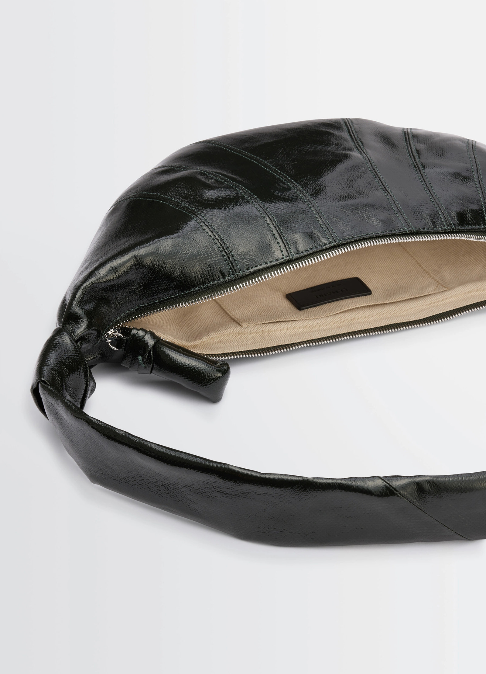 Lemaire medium croissant bag in shiny coated cotton canvas, product shot, top side detail shot interior view and zip detail