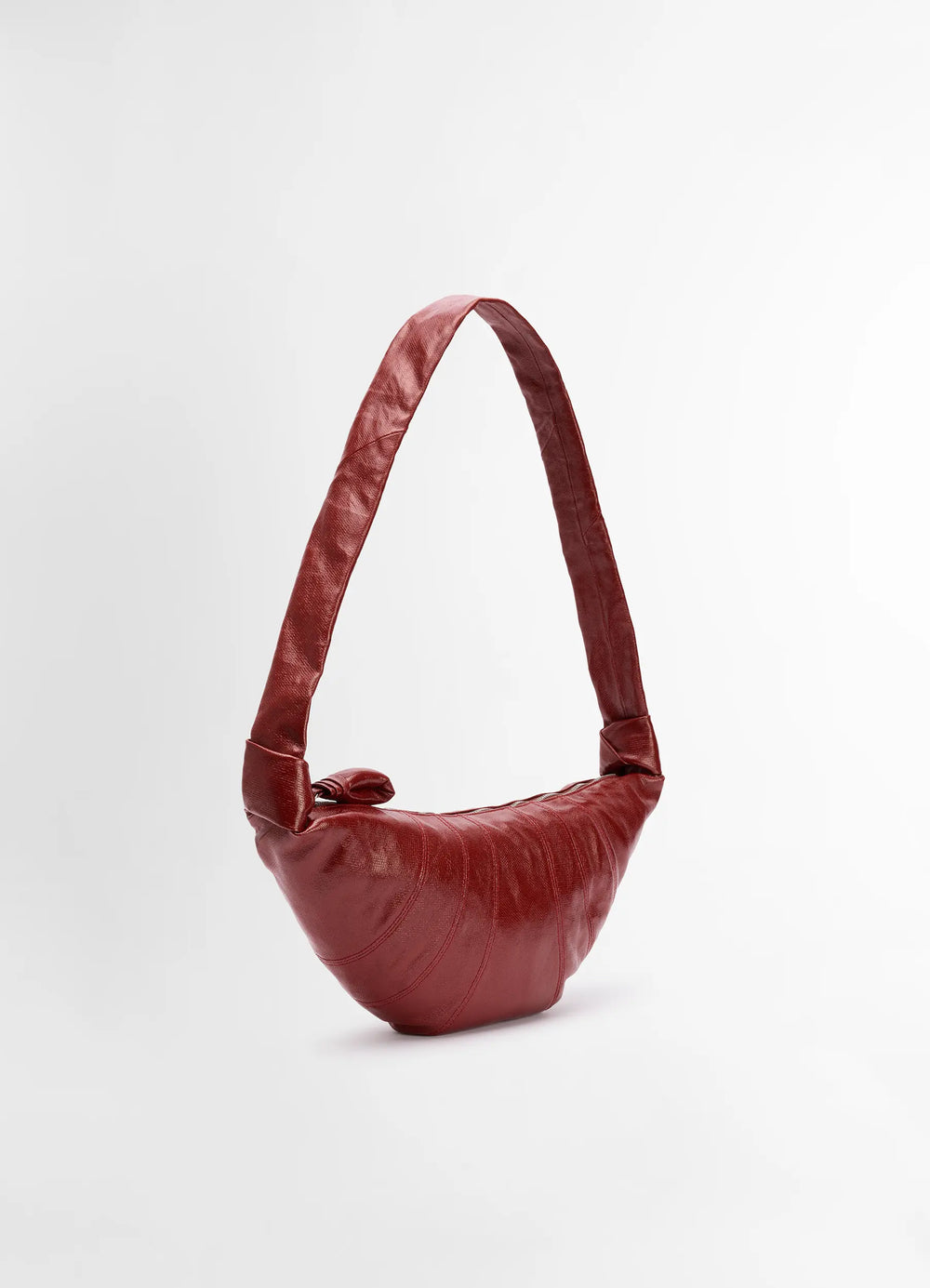 Lemaire Medium Croissant Bag in Coated cotton canvas, product shot, three-quarter view textured fabric, curved shape