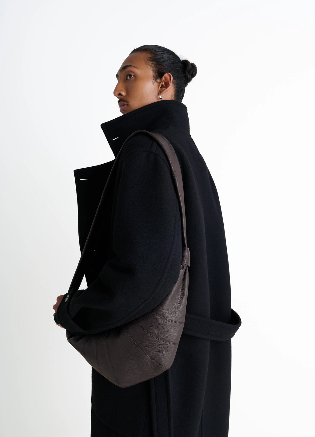 Lemaire Medium Croissant Bag in Grained Leather, model shot, Side view Knotted elements