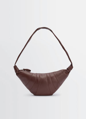 Lemaire medium croissant bag in grained leather, product shot, front view knotted strap detail