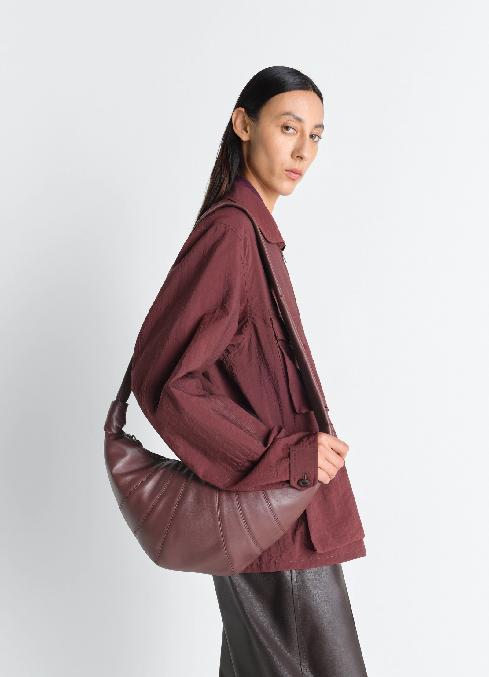 Fortune croissant bag in soft nappa lambskin, model shot, side view curved underarm fit