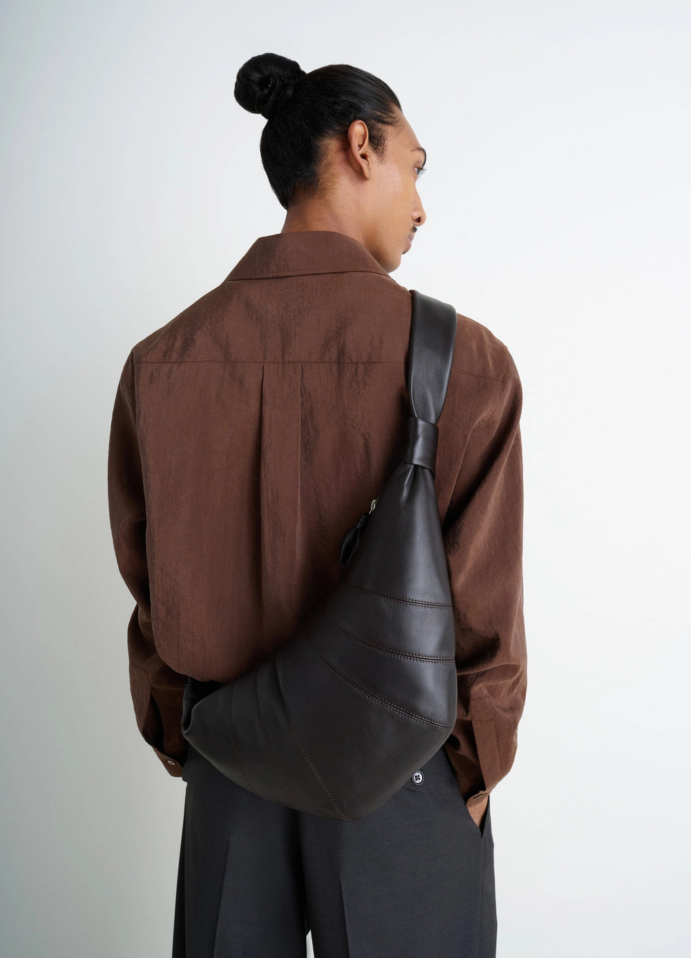 MEDIUM CROISSANT BAG in Nappa lamb leather, model shot, back view draped on shoulder