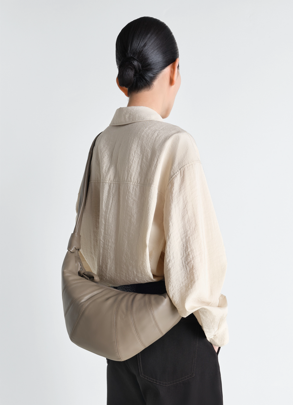 Medium Croissant Bag in Leather in Nappa Lamb Leather, model shot, back view curved shape