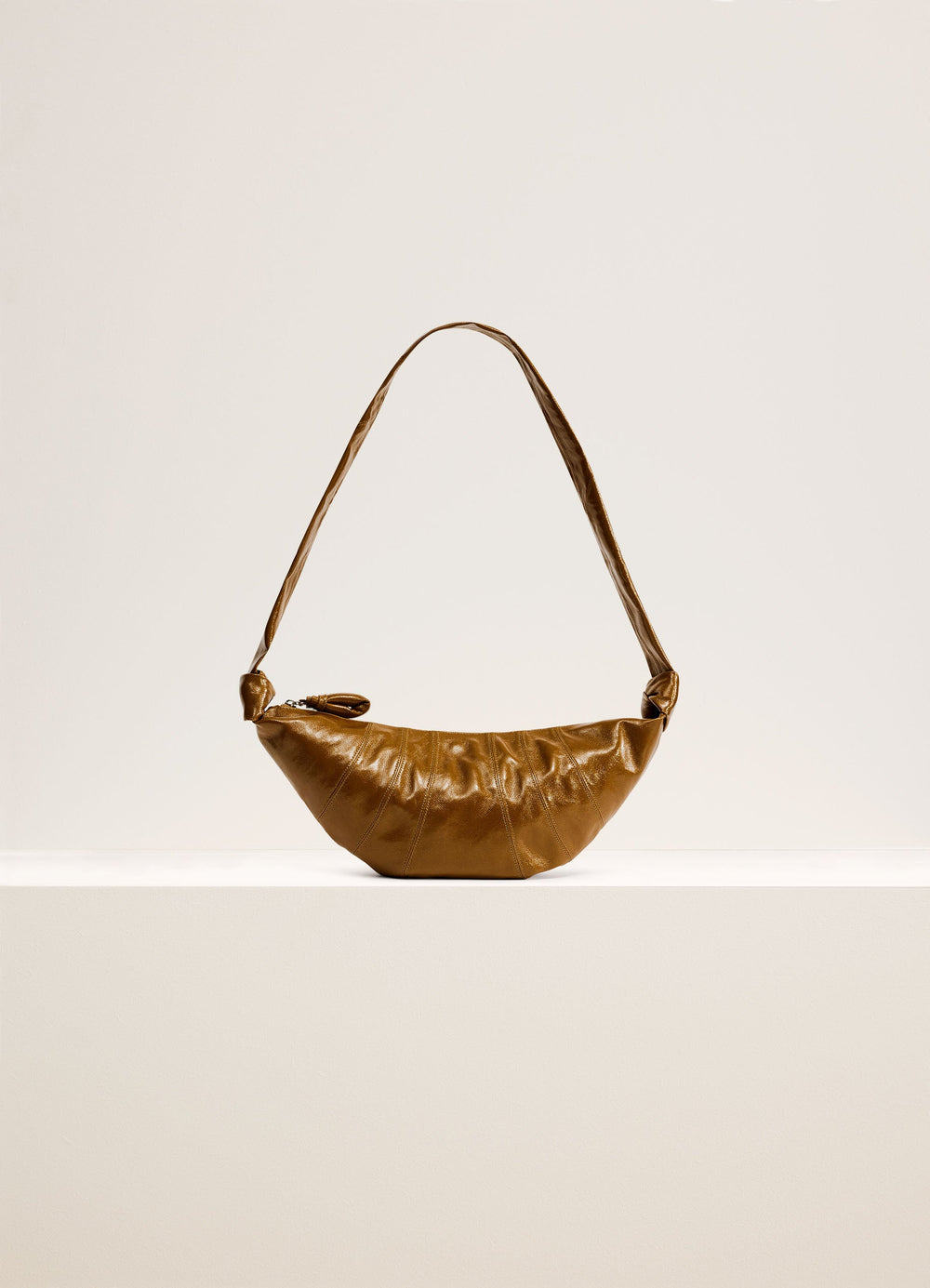 Lemaire Medium Croissant Bag in Coated Cotton Shiny Finish, product shot, Front view Top-stitched cutouts
