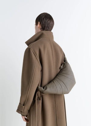 Medium Croissant Bag in Grained Leather, model shot, Back view Knotted elements