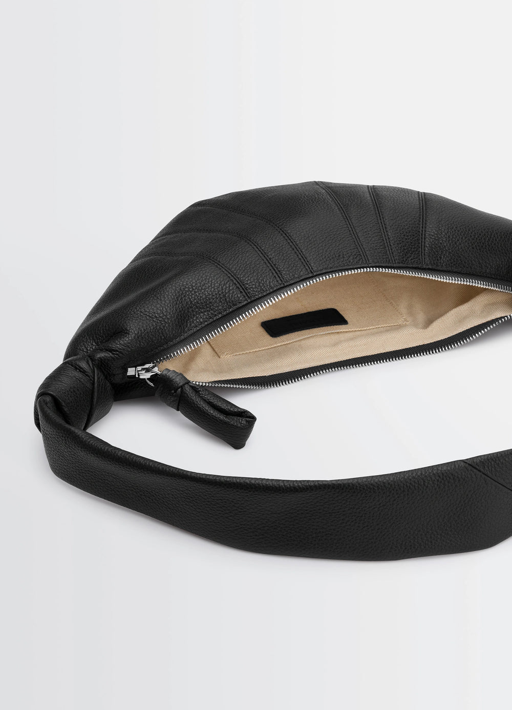 Small Croissant Bag in Black Grained Leather, product shot, top view zipper open interior view