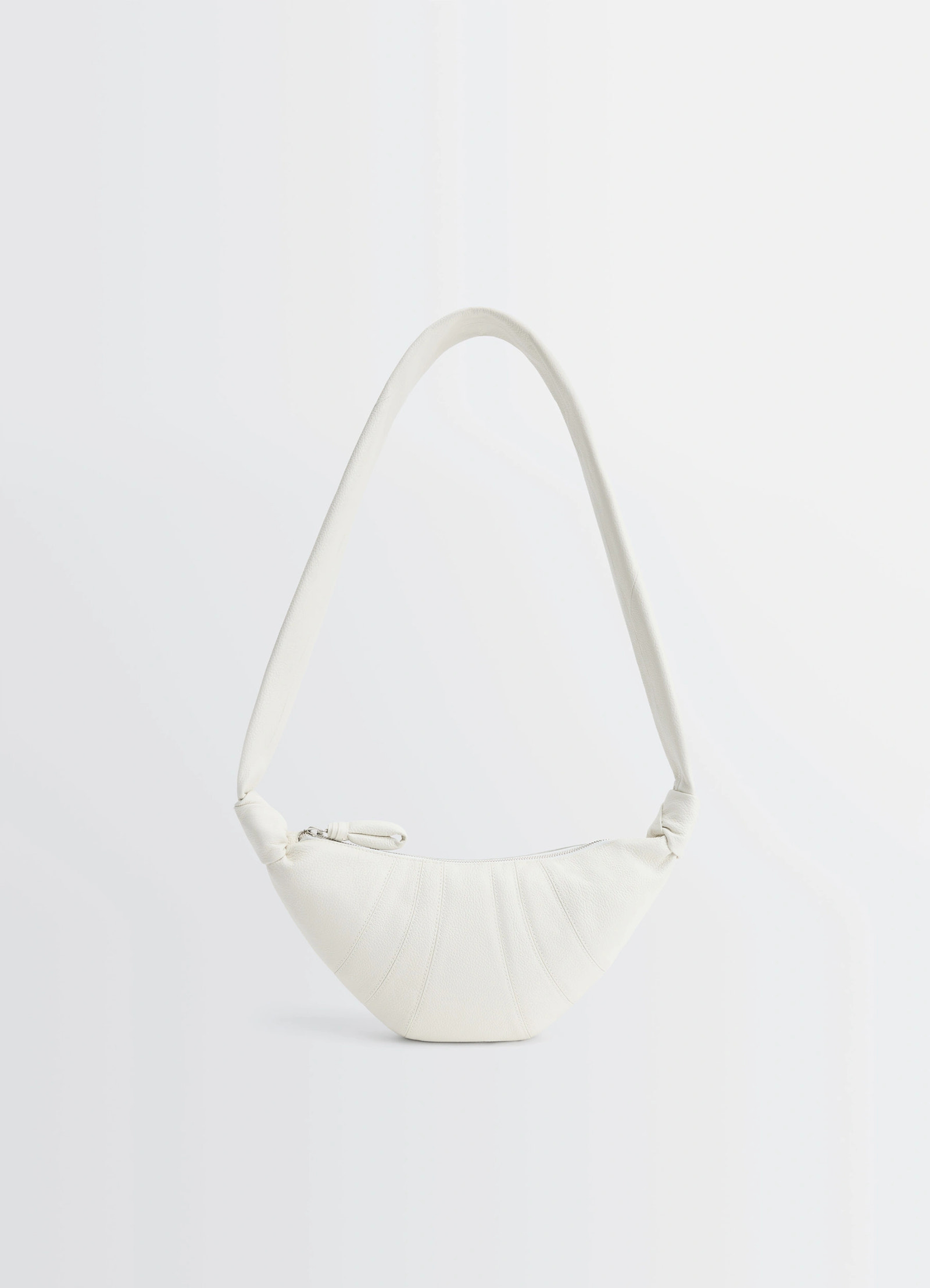 Lemaire small croissant bag in soft grained leather, product shot, front view curved design
