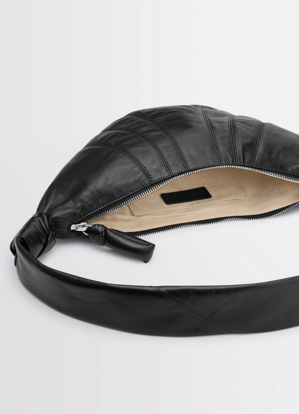 Lemaire Small Croissant Bag in Black Nappa Lamb Leather, product shot, top zipper detail view exposed interior with zipper