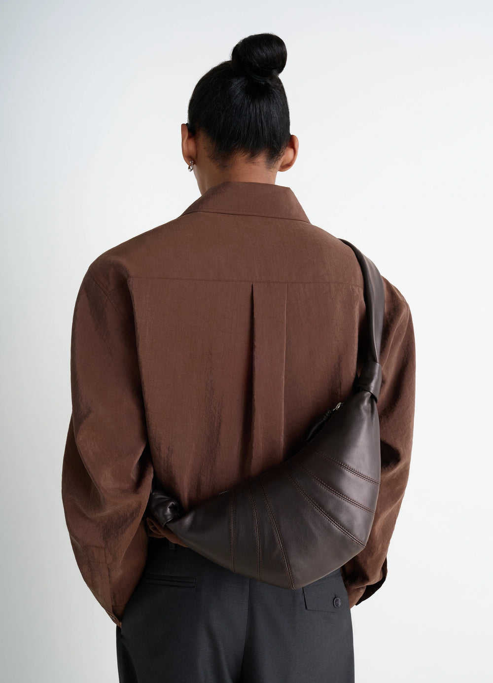 Lemaire Small Croissant Bag in Nappa Lamb Leather, model shot, Back view Supple curve design