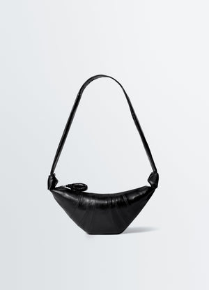 Small black coated cotton croissant bag lemaire front view on plain white background
