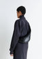 Lemaire Small Croissant Bag in Black Coated Cotton, model shot, Side view Shoulder worn