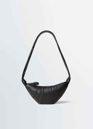 Small black leather croissant bag lemaire front view on plain white background with knotted strap detail