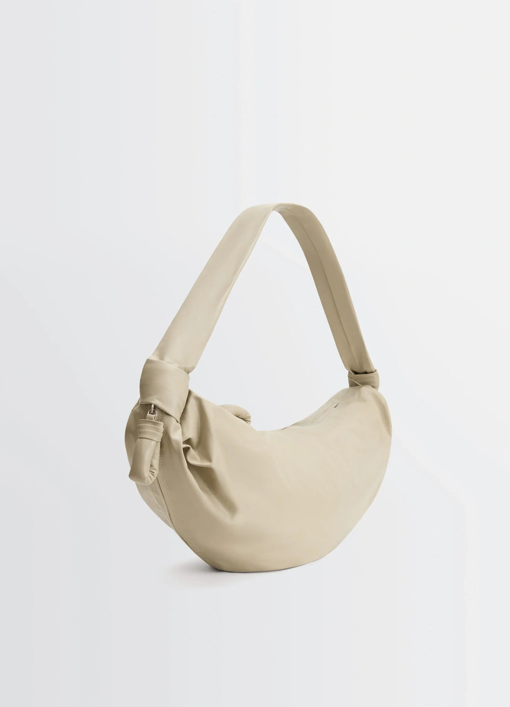 Lemaire Large Soft Croissant in Paper-effect leather, product shot, angled top view long strap visible